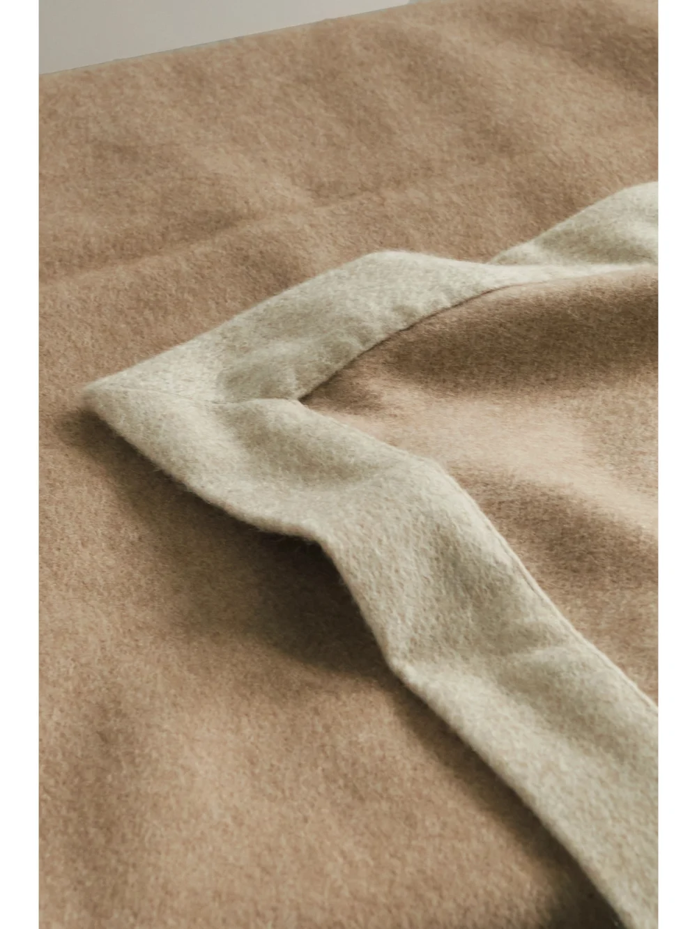 Close-up detail of the Brunello Cucinelli Two-tone Cashmere Blanket