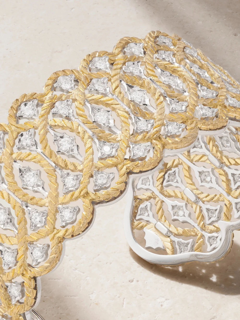 Close-up detail of the Buccellati Étoilée 18-karat Yellow and White Gold Diamond Cuff