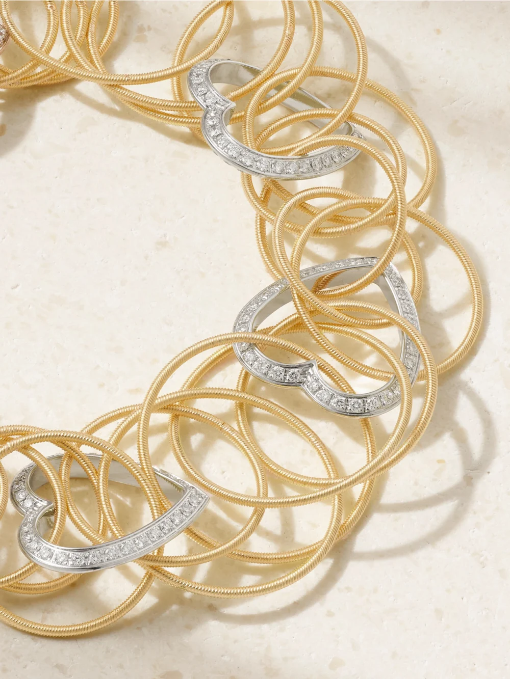 Close-up detail of the Buccellati Hawaii 18-karat Yellow and White Gold Diamond Bracelet