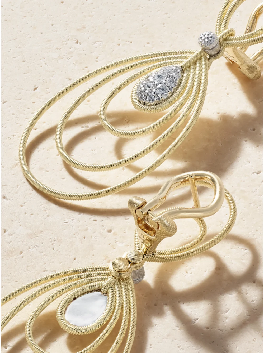 Close-up detail of the Buccellati Hawaii 18-karat Yellow and White Gold Diamond Earrings