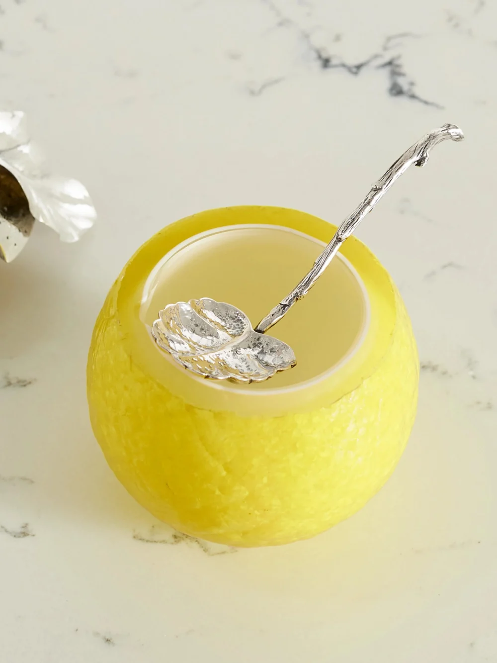 Close-up detail of the Buccellati Lemon Sterling Silver and Glass Jam Jar