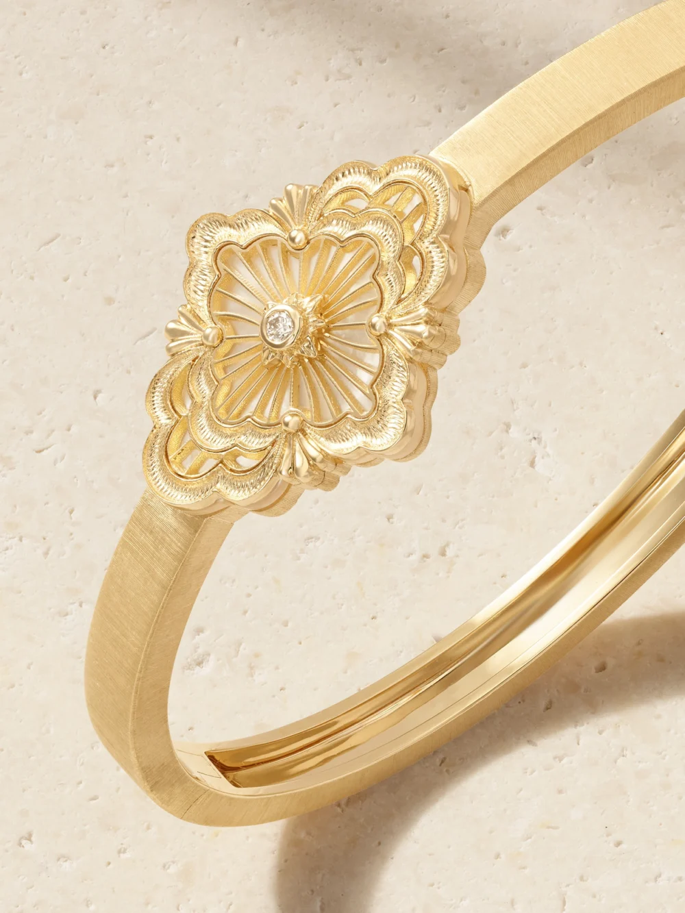 Close-up detail of the Buccellati Opera Tulle 18-karat Gold, Mother-of-pearl and Diamond Bangle