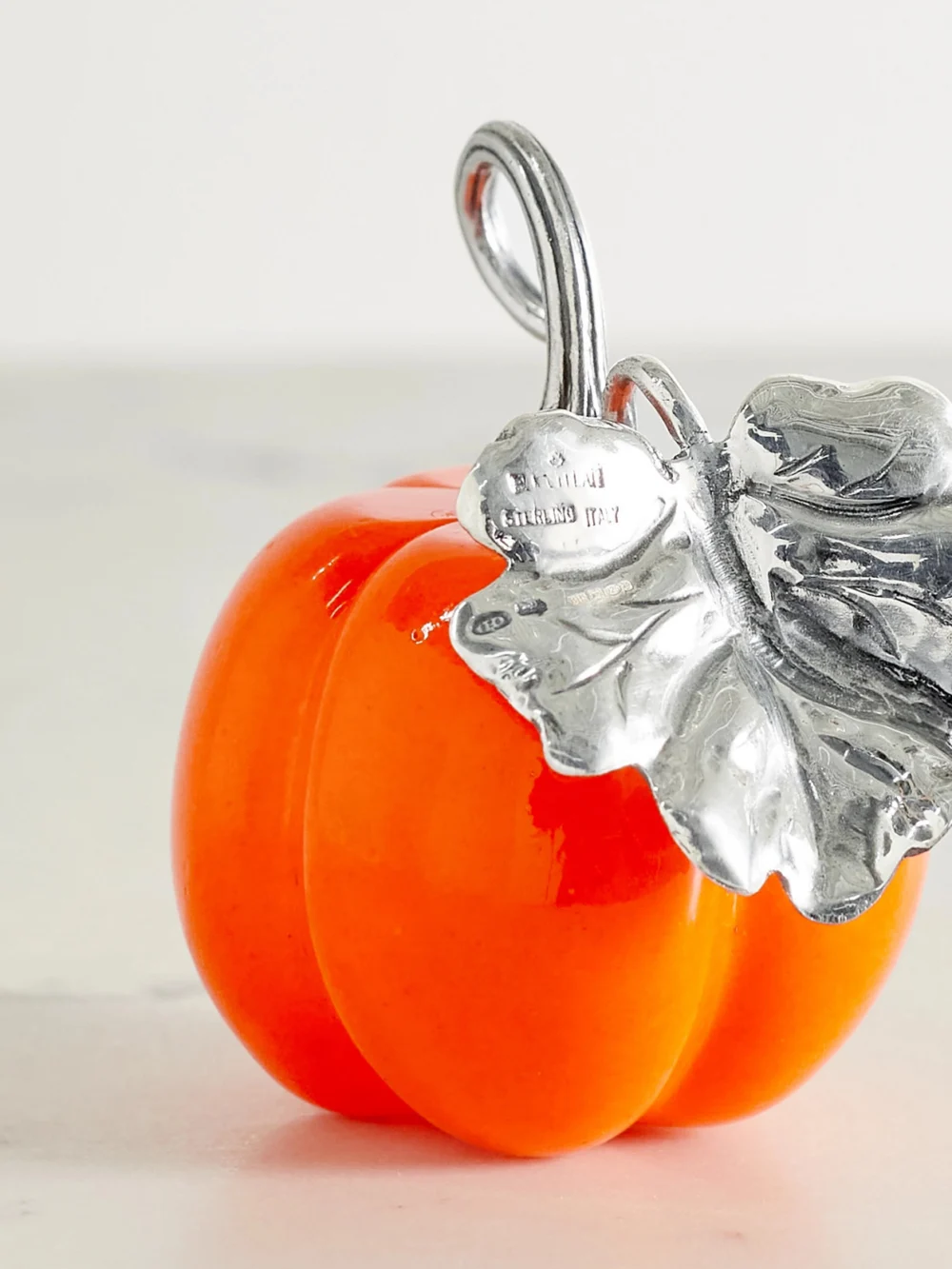 Close-up detail of the Buccellati Pumpkin Sterling Silver and Glass Table Marker