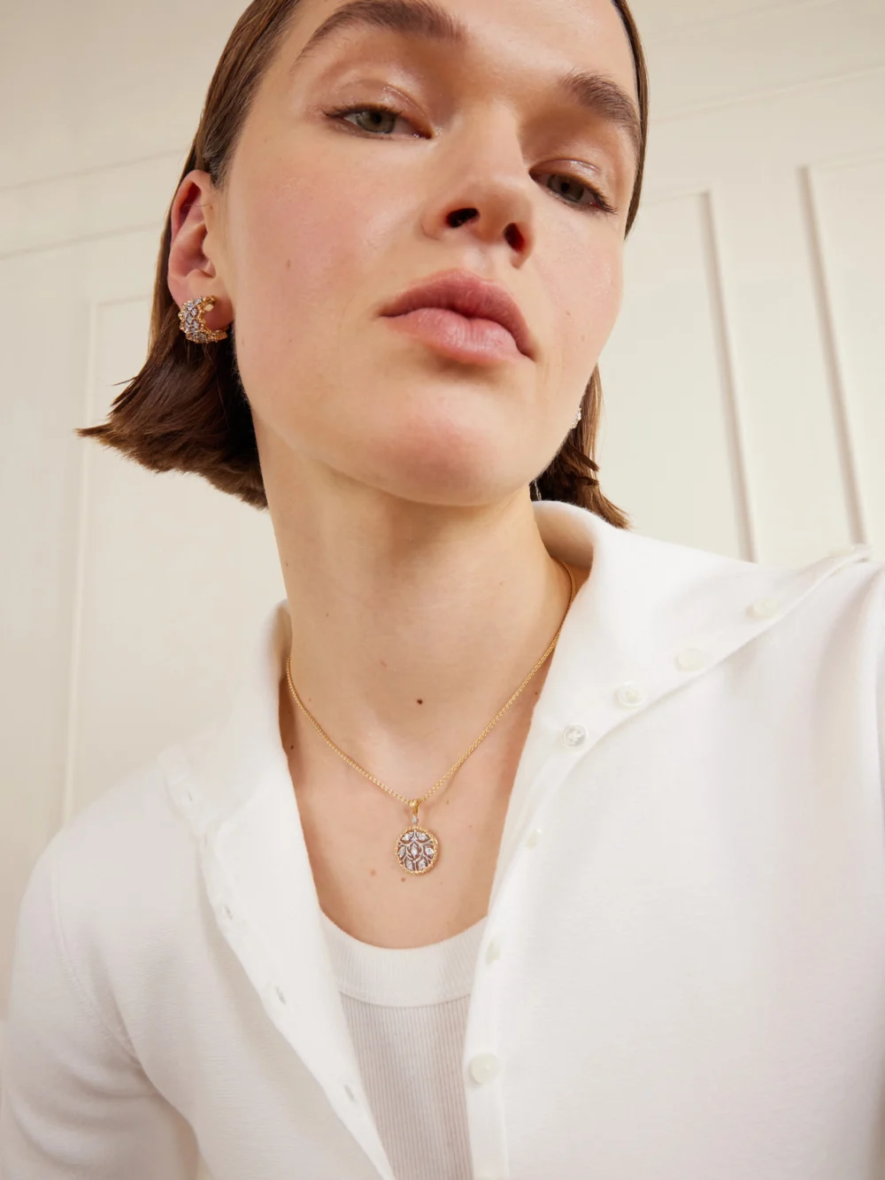 Buccellati Rombi 18-karat Yellow and White Gold Diamond Earrings, styled view