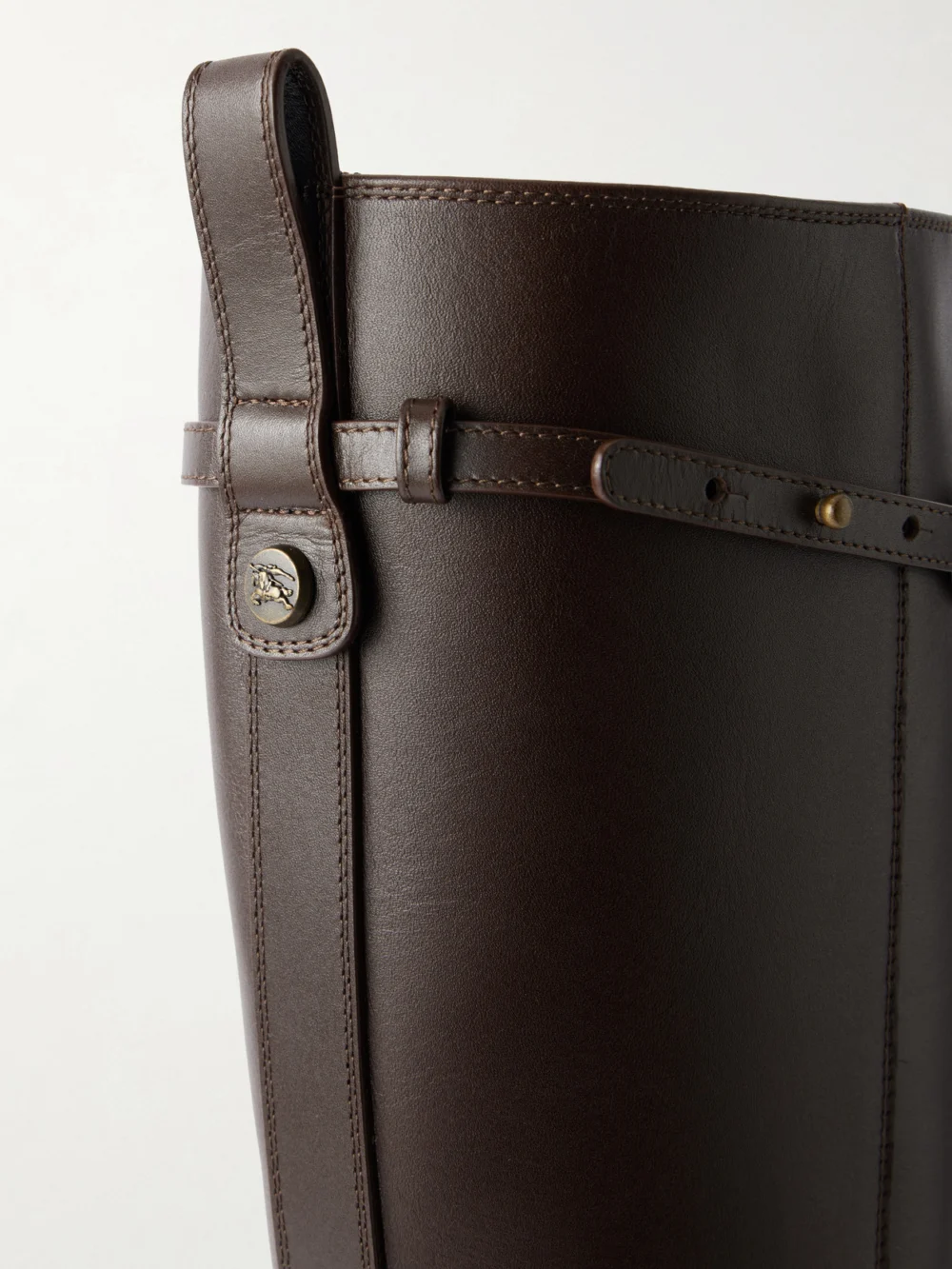Close-up detail of the Burberry 100 Belted Leather Knee-high Boots