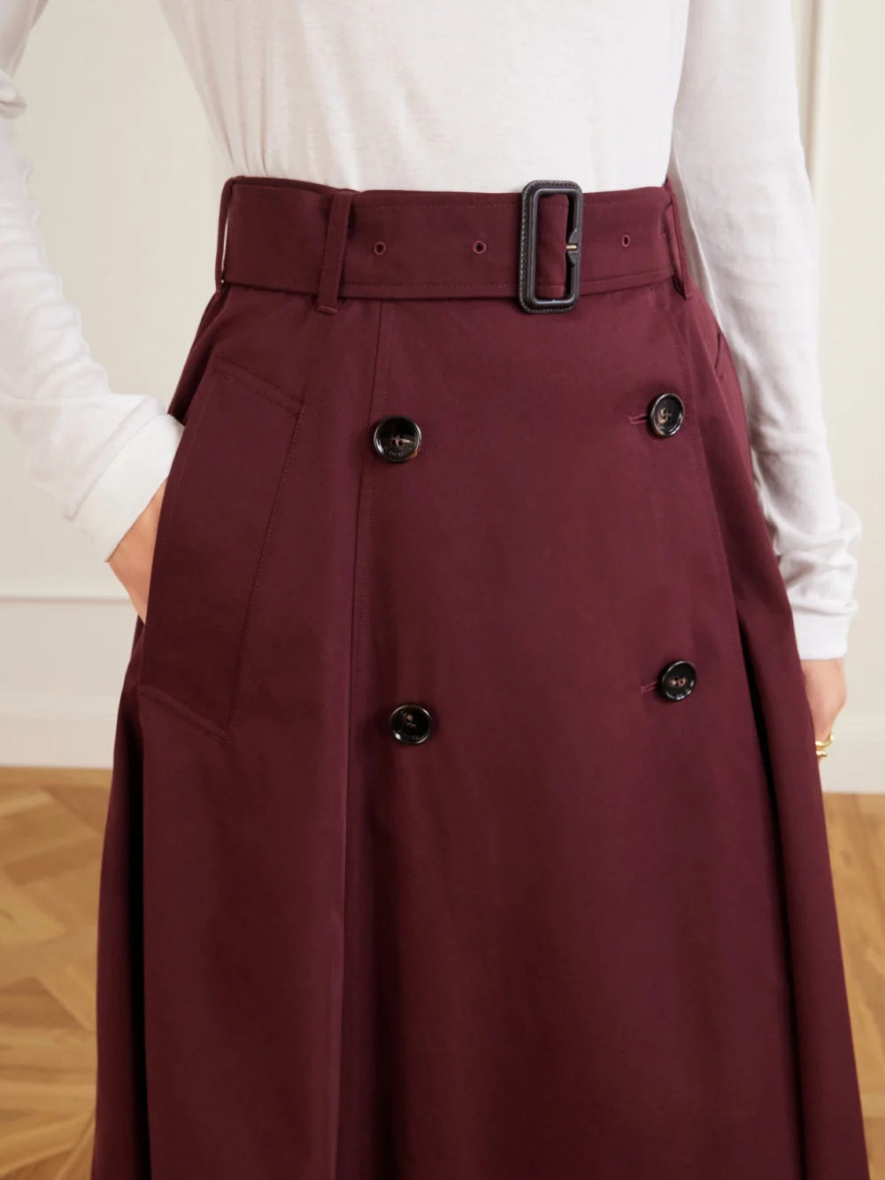 Close-up detail of the Burberry Belted Wool Midi Skirt