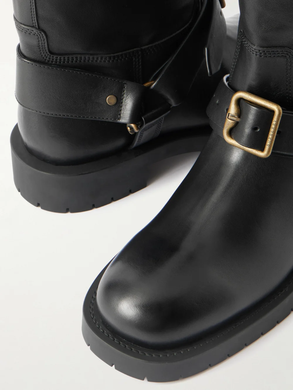 Close-up detail of the Burberry Buckled Leather Boots