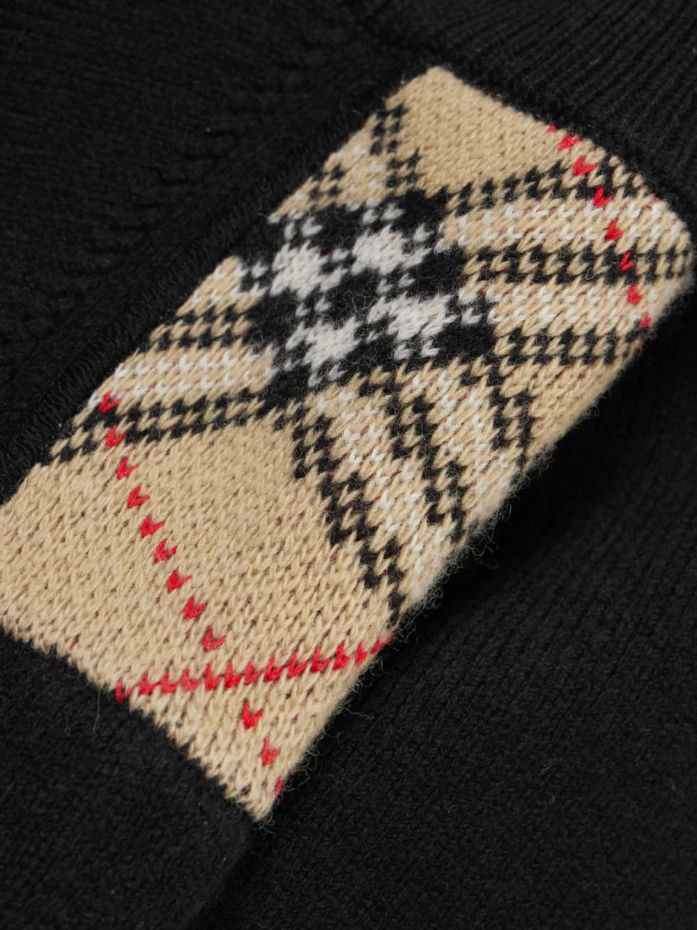 Close-up detail of the Burberry Checked Ribbed Wool and Cashmere-blend Turtleneck Cardigan