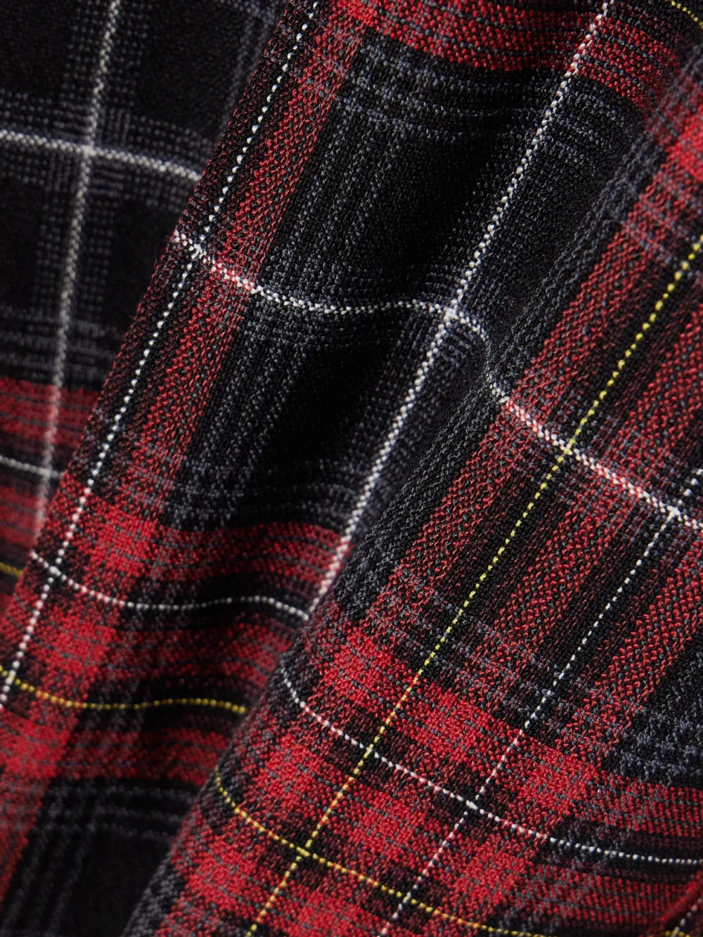 Close-up detail of the Burberry Checked Woven Skinnys Pants