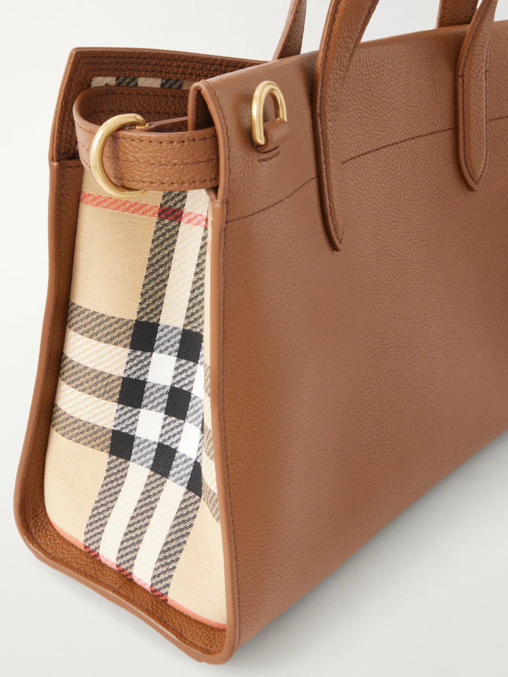 Close-up detail of the Burberry Cotswolds Small Checked Canvas-trimmed Leather Tote