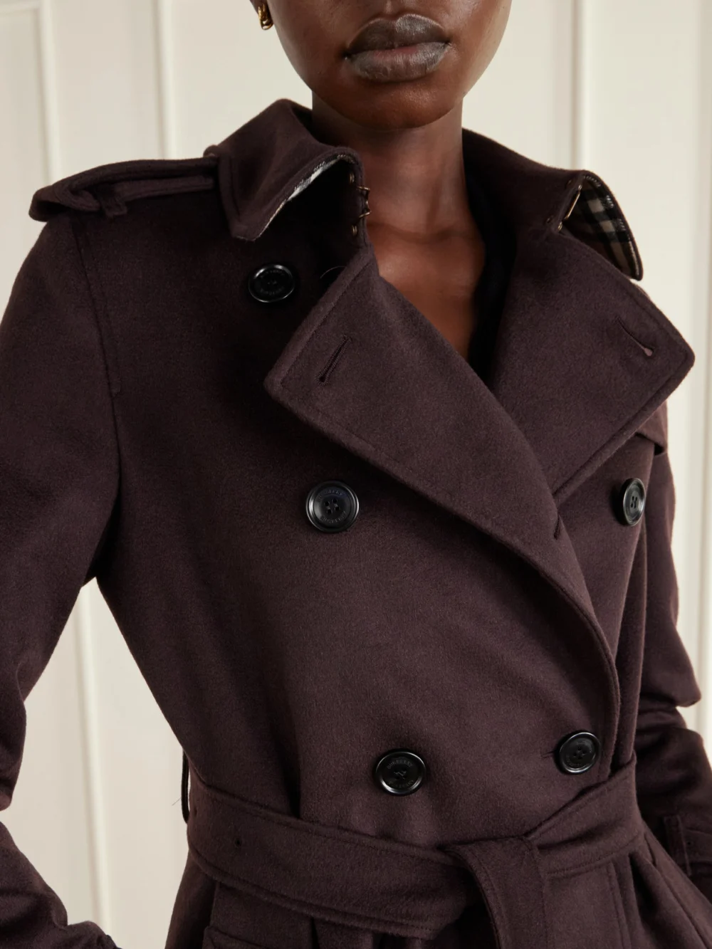 Close-up detail of the Burberry Double-breasted Belted Cashmere Trench Coat