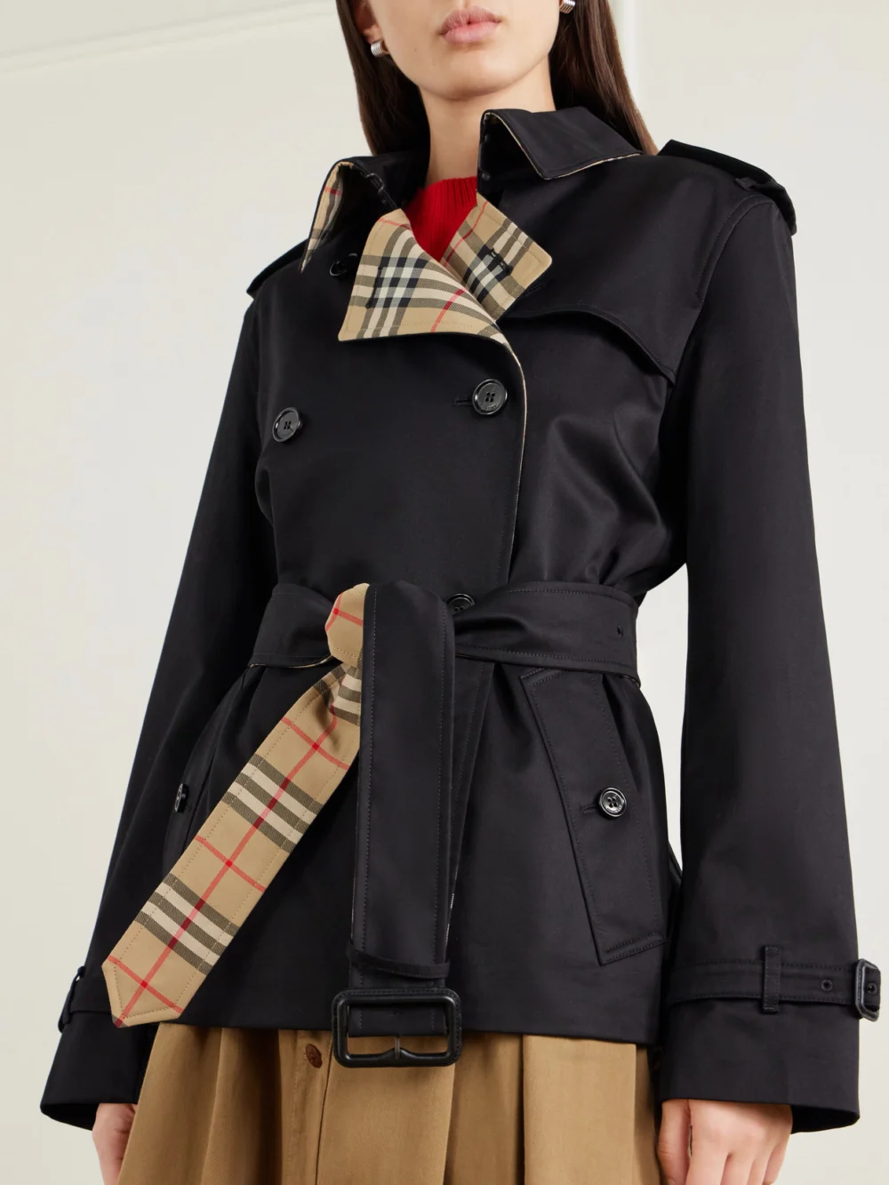 Close-up detail of the Burberry Double-breasted Belted Checked Cotton-gabardine Trench Coat