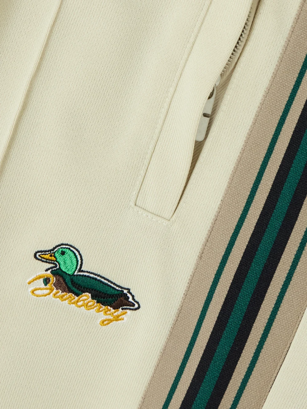 Close-up detail of the Burberry Embroidered Striped Jersey Track Pants