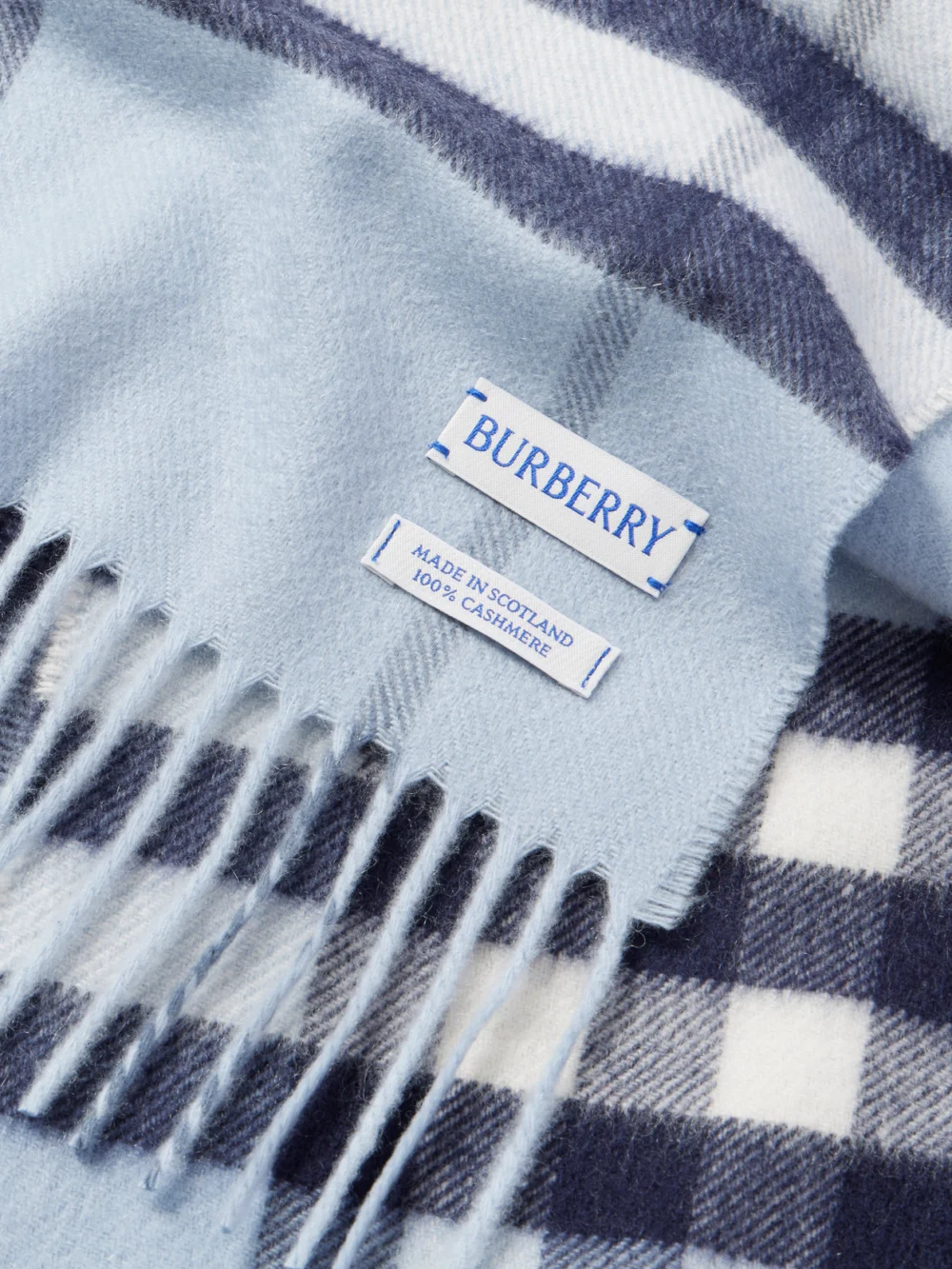 Close-up detail of the Burberry Fringed Checked Cashmere Scarf