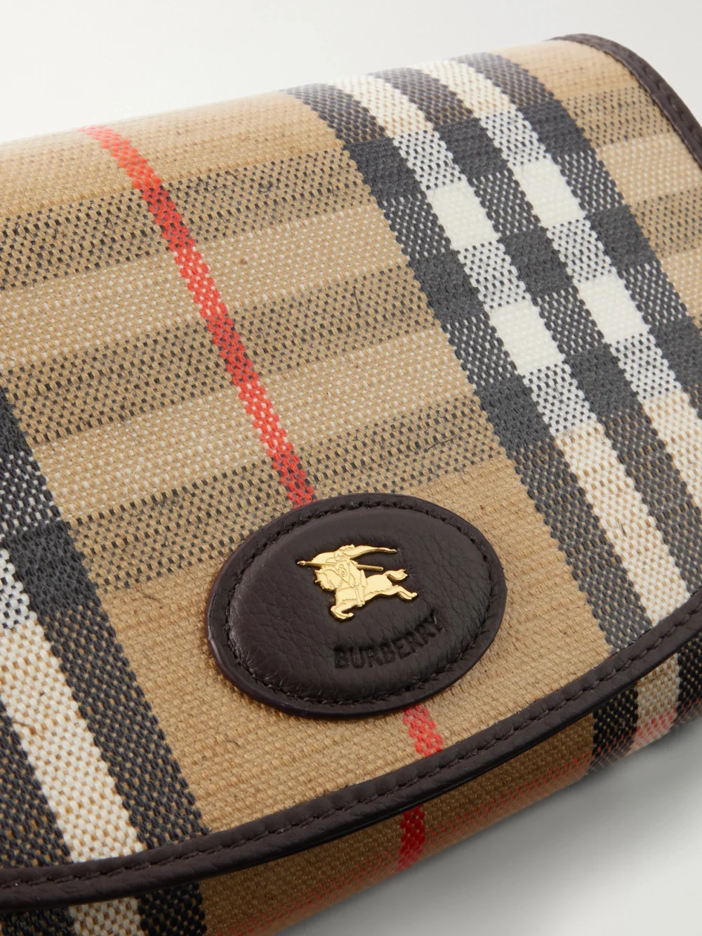 Close-up detail of the Burberry Highlands Checked Clutch
