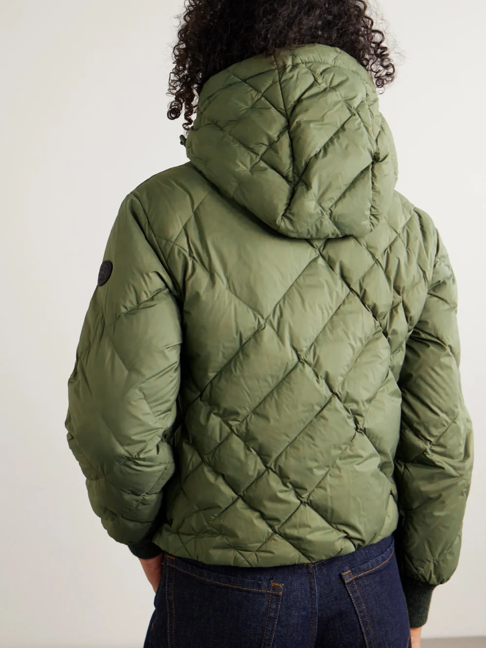 Back view of the Burberry Hooded Appliquéd Leather-trimmed Padded Quilted Shell Down Jacket