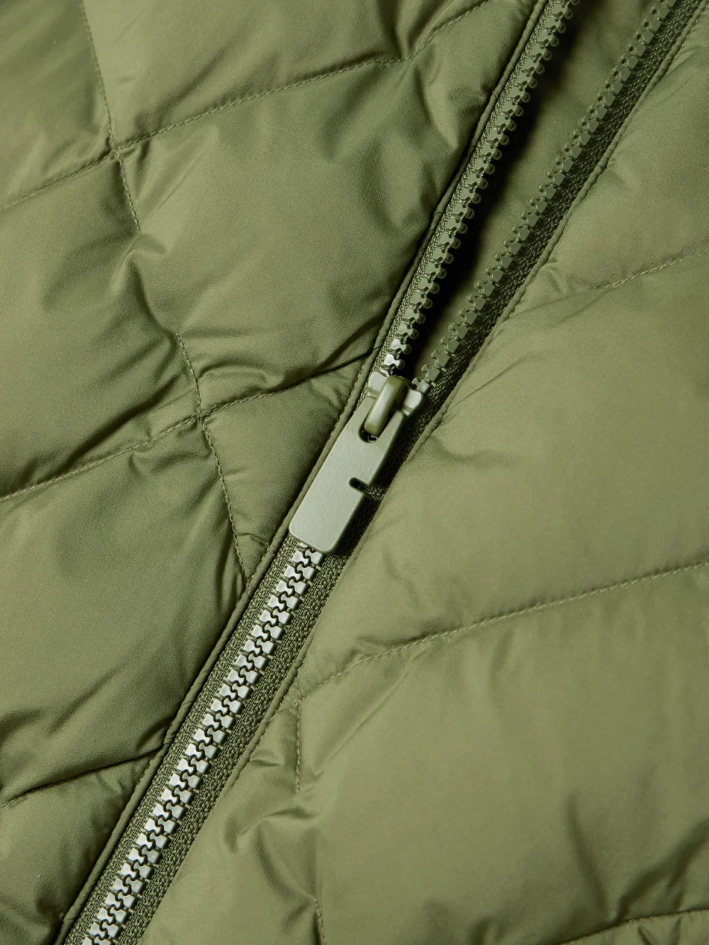 Close-up detail of the Burberry Hooded Appliquéd Leather-trimmed Padded Quilted Shell Down Jacket