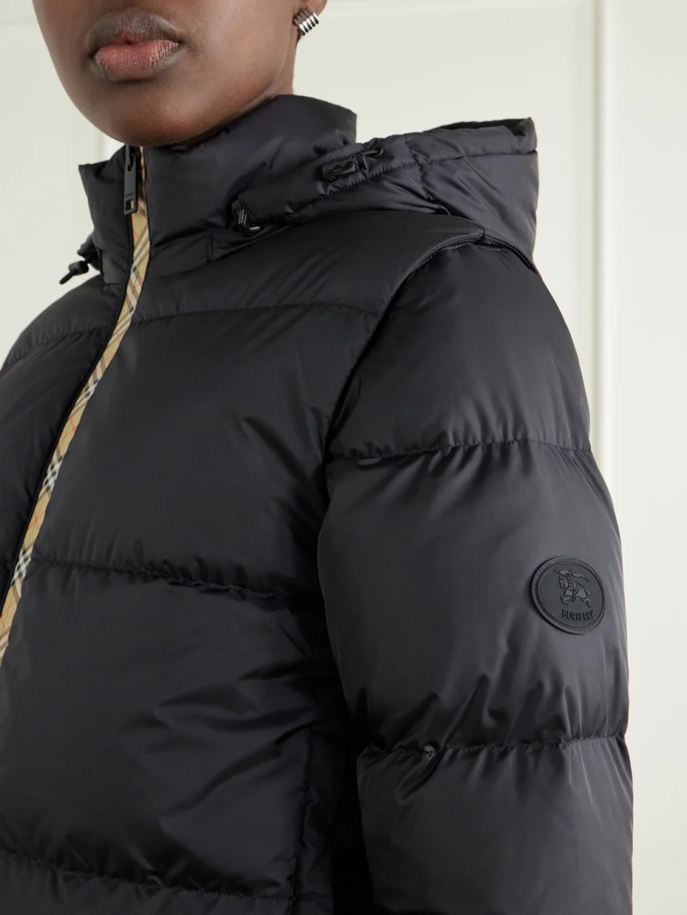 Close-up detail of the Burberry Hooded Logo-appliquéd Quilted Shell Jacket
