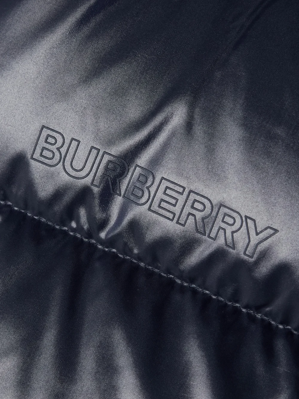 Close-up detail of the Burberry Hooded Quilted Shell Down Vest