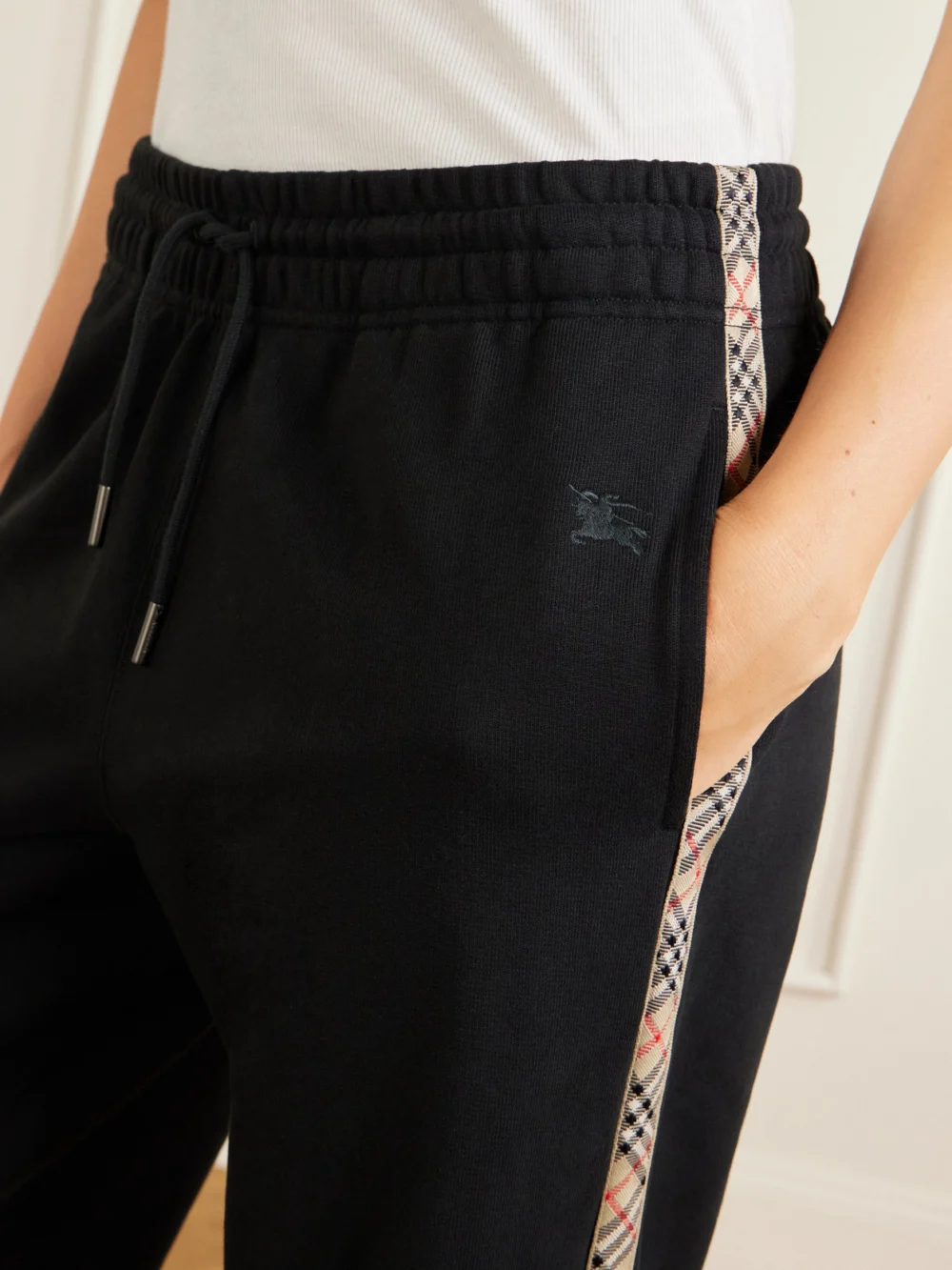 Close-up detail of the Burberry Jodie Checked Cotton-jersey Straight-leg Track Pants