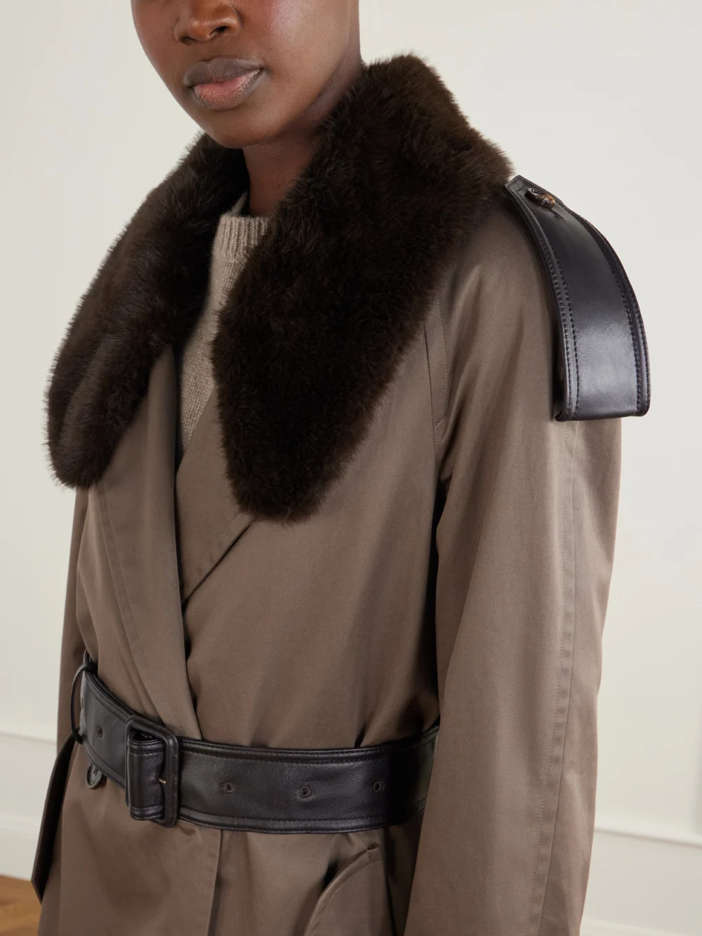 Close-up detail of the Burberry Leather and Plush-trimmed Cotton-gabardine Trench Coat