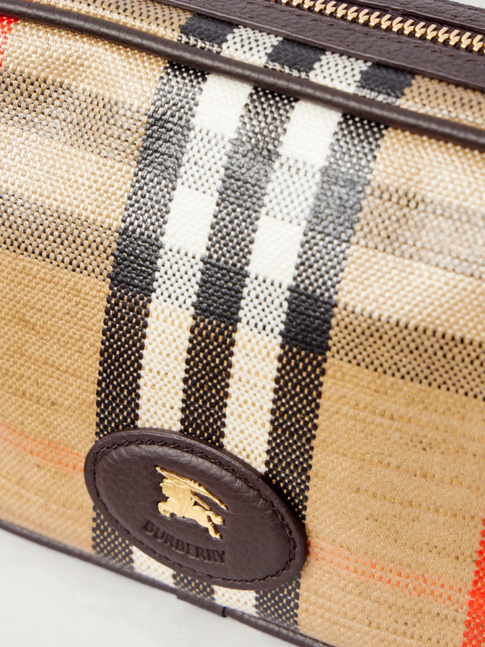 Close-up detail of the Burberry Leather-trimmed Checked Coated-canvas Pouch