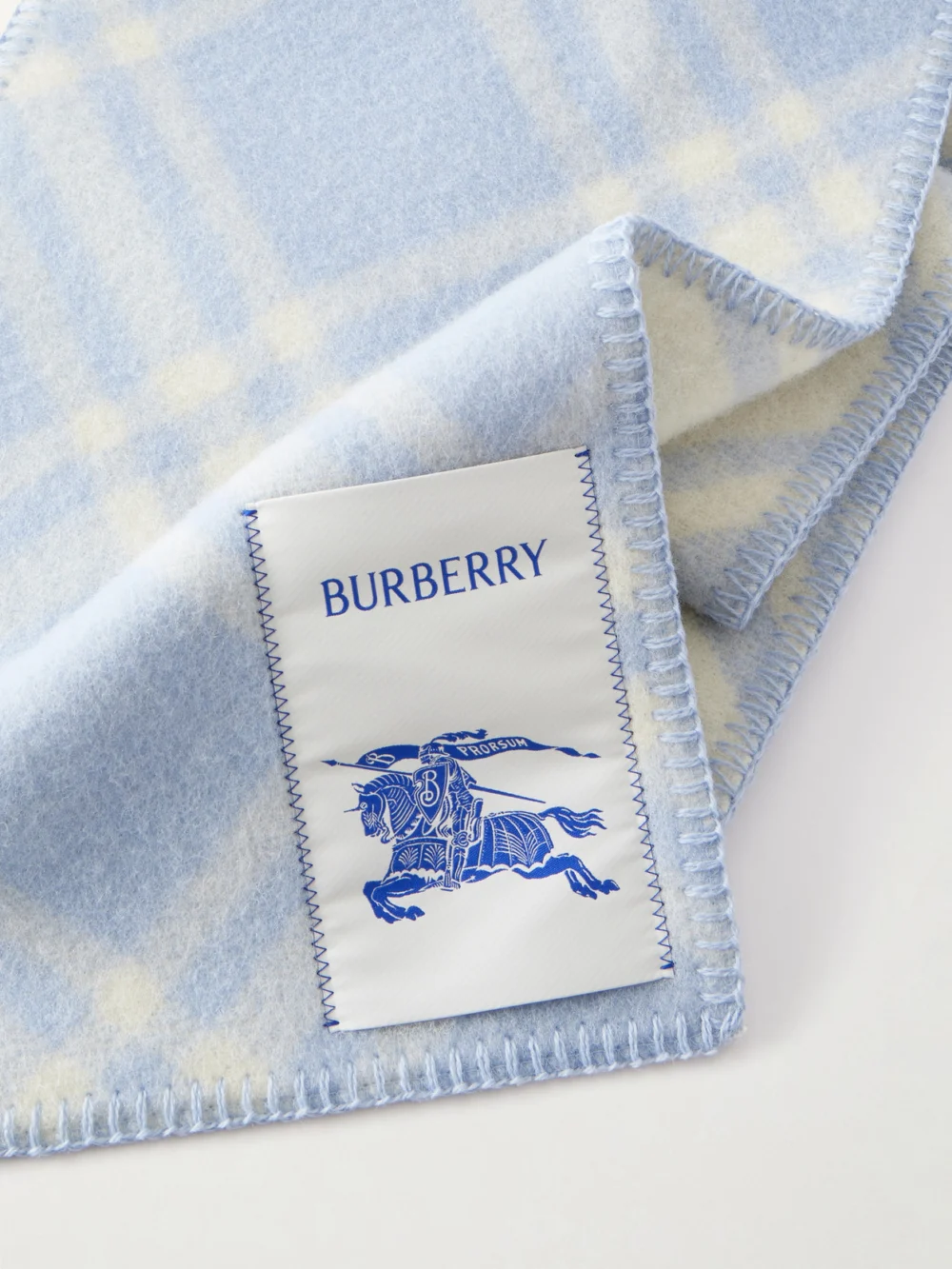 Close-up detail of the Burberry Logo-appliquéd Checked Wool Scarf