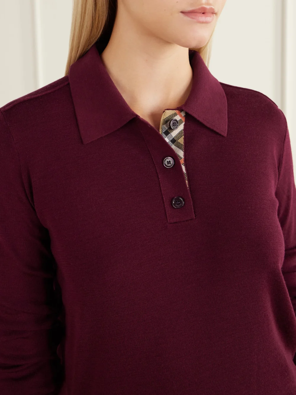 Close-up detail of the Burberry Mandy Ribbed-detail Wool Polo Sweater