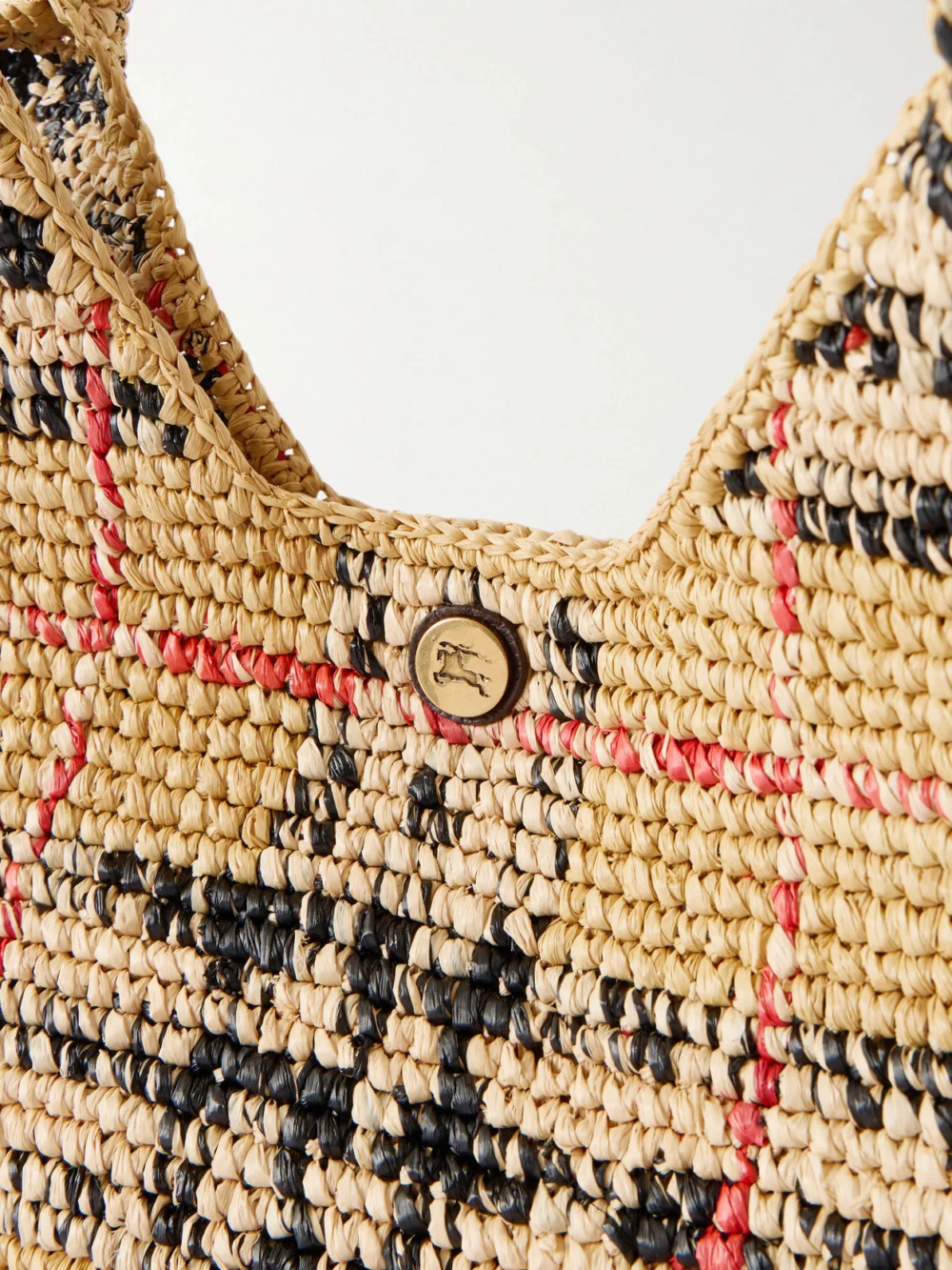 Close-up detail of the Burberry Margate Checked Woven Raffia Tote