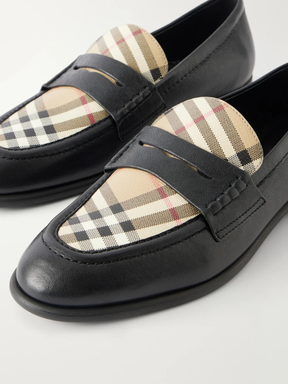 Close-up detail of the Burberry Opal Check-trimmed Leather Penny Loafer