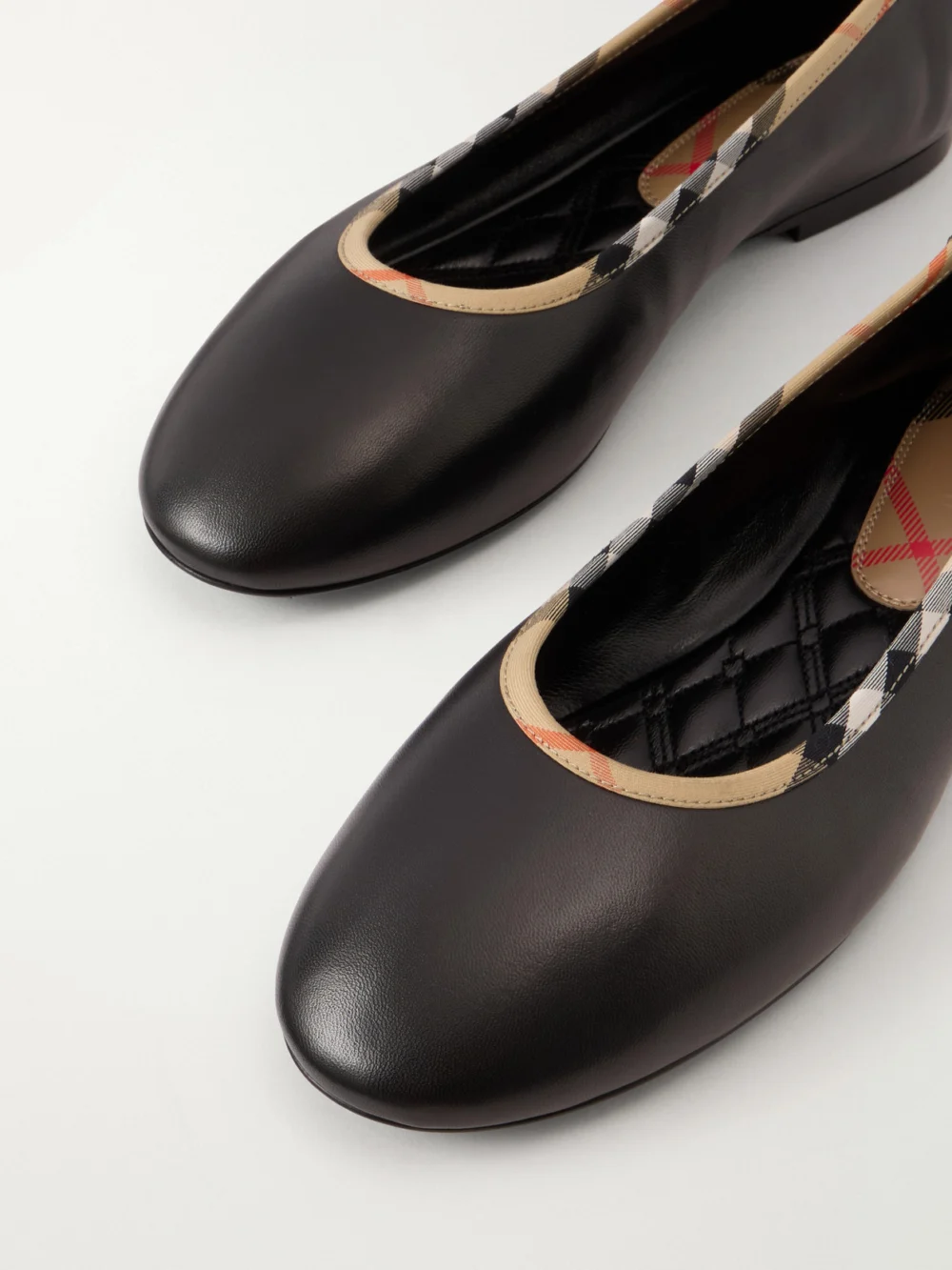Close-up detail of the Burberry Robin Check Trim Leather Ballet Flats