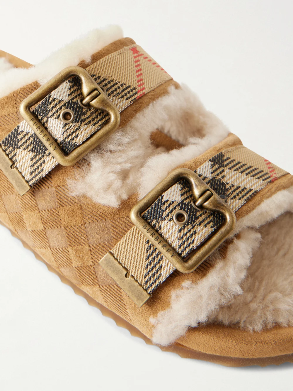 Close-up detail of the Burberry Urchin Check Shearling-trimmed Sandals