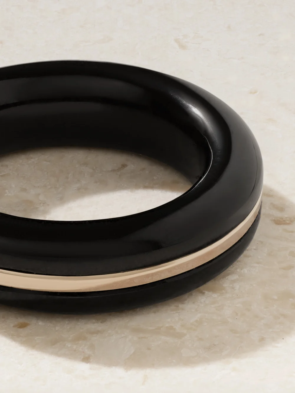 Close-up detail of the By Pariah Essential Stacking 14-karat Recycled Gold Onyx Ring