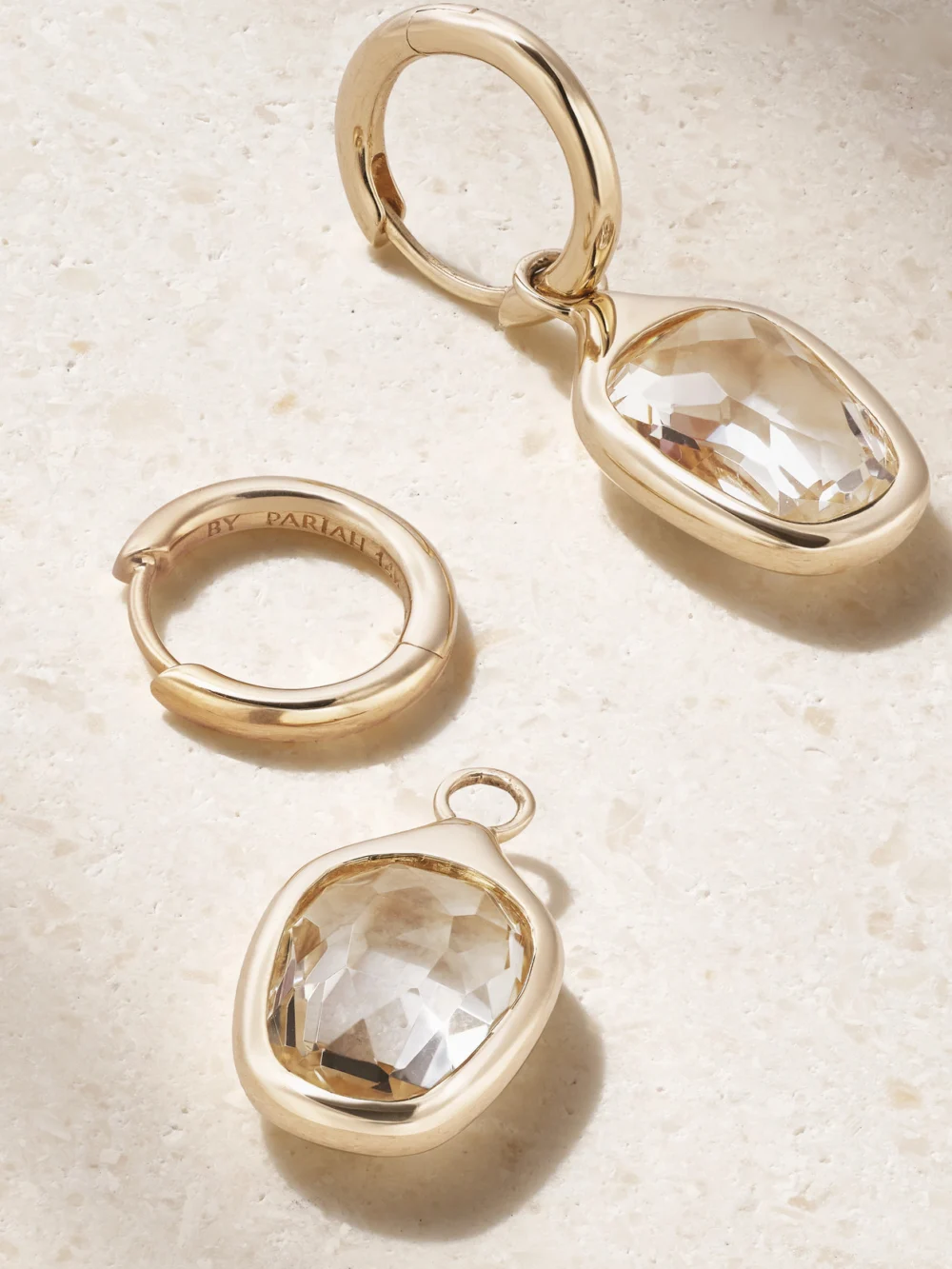 Close-up detail of the By Pariah Orbit Prism 14-karat Recycled Gold Topaz Hoop Earrings