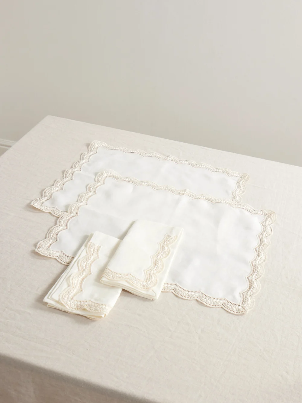 Cabana Emilia Set of Two Scalloped Embroidered Linen Placemats and Napkins in ivory