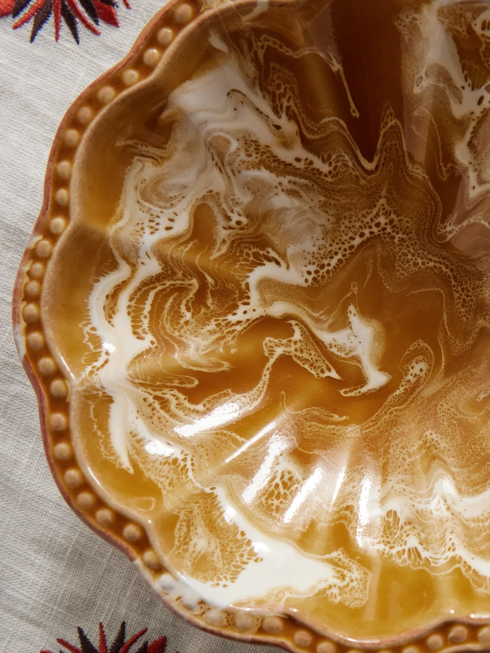 Close-up detail of the Cabana Set of Two Small Scalloped Ceramic Bowls