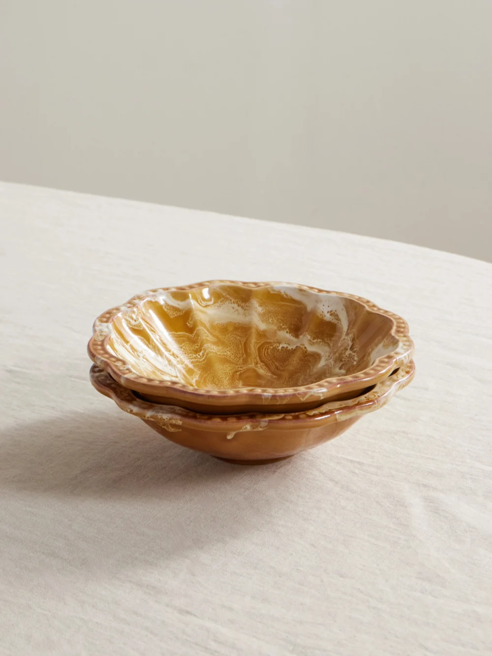 Cabana Set of Two Small Scalloped Ceramic Bowls in pastel orange