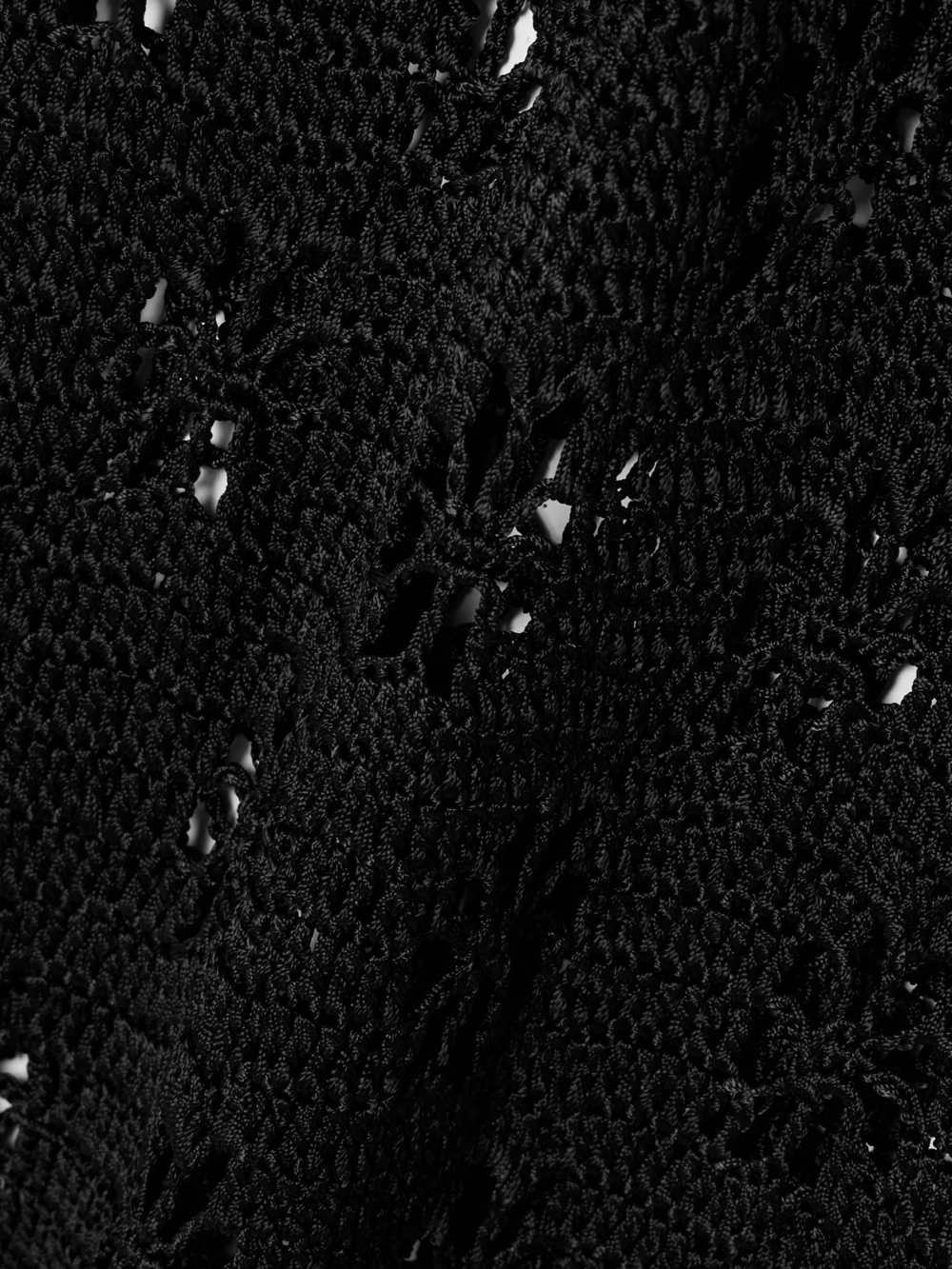Close-up detail of the Calle Del Mar Floral Crocheted Midi Skirt