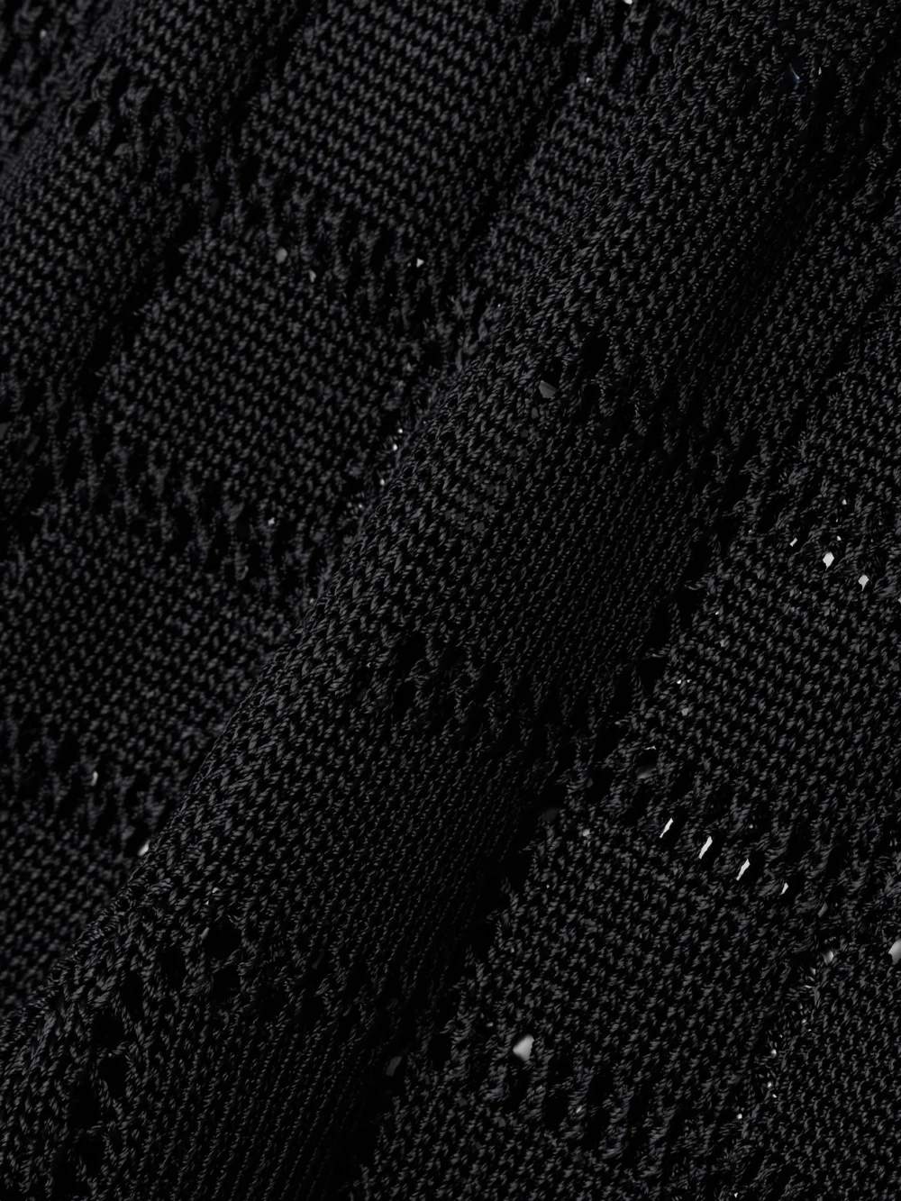 Close-up detail of the Calle Del Mar Pointelle-knit Wide-leg Pants