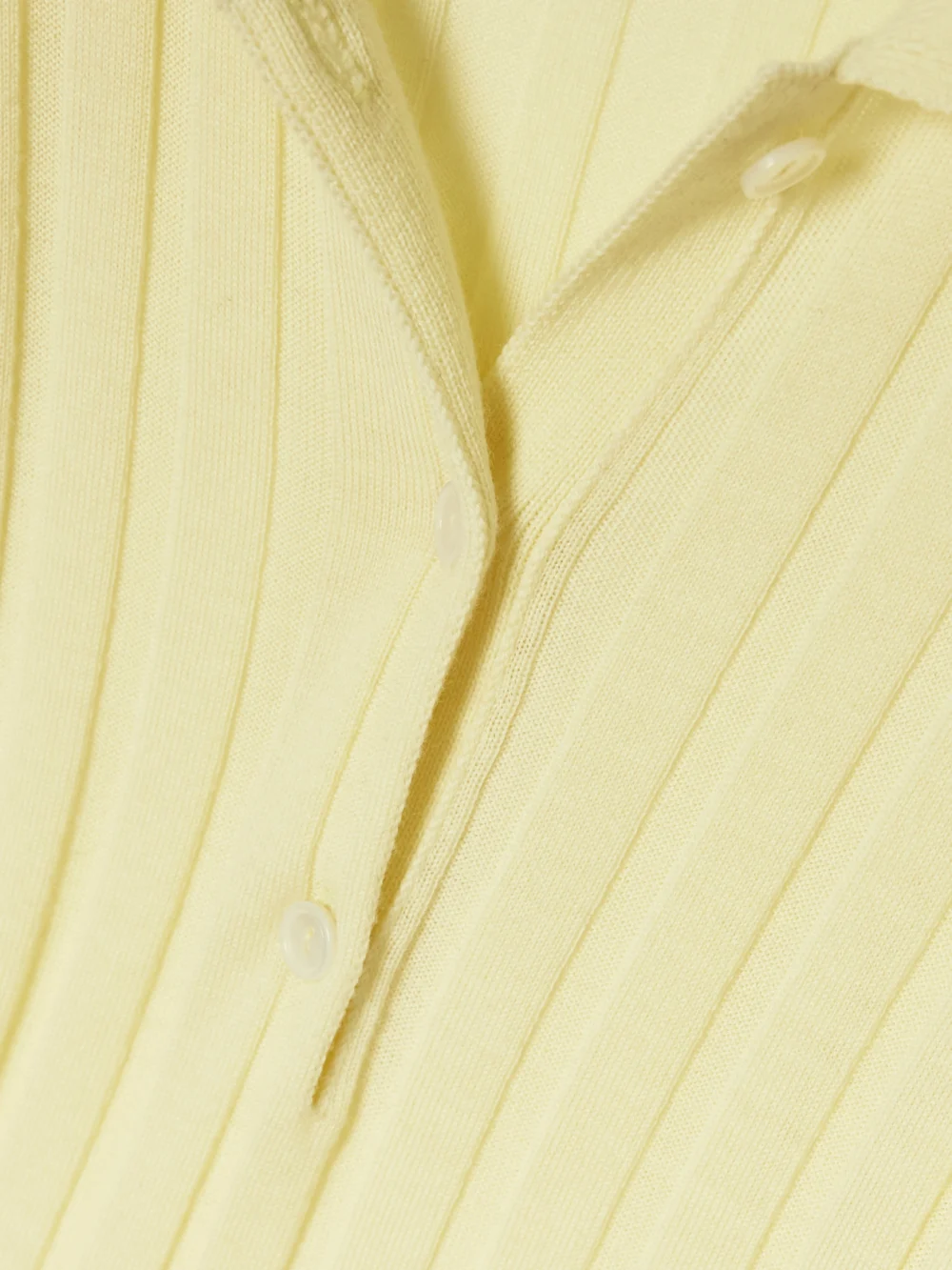 Close-up detail of the Calvin Klein Collection Amber Ribbed Wool Polo Sweater