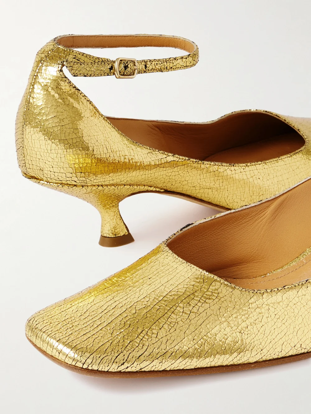 Close-up detail of the Calvin Klein Collection Anna Metallic Cracked-leather Pumps