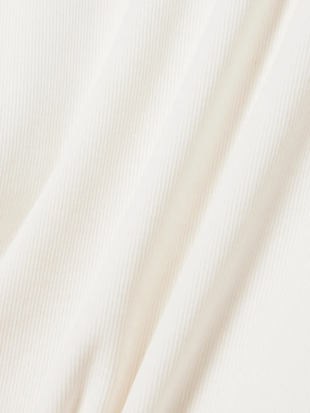 Close-up detail of the Calvin Klein Collection Aubriella Ribbed Organic Cotton-blend Jersey T-shirt