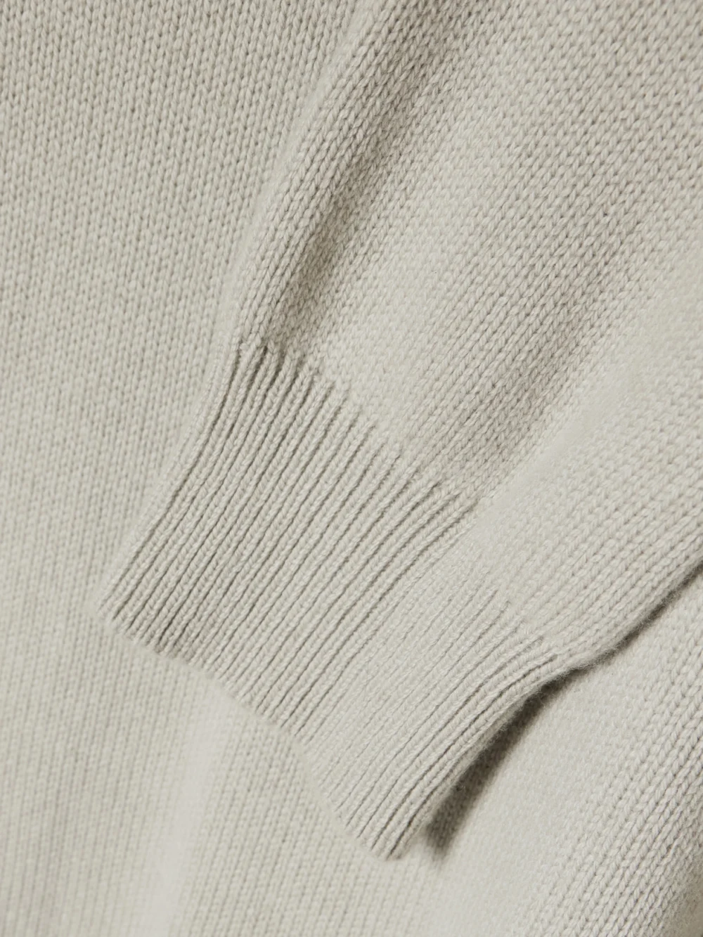 Close-up detail of the Calvin Klein Collection Mia Scarf-detailed Cashmere Sweater