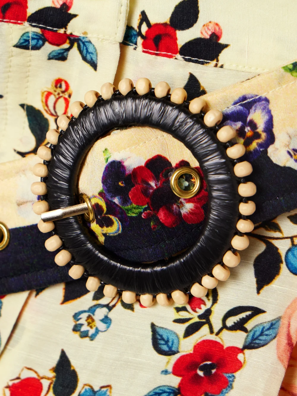 Close-up detail of the Camilla Belted Printed Linen and Silk-blend Shorts