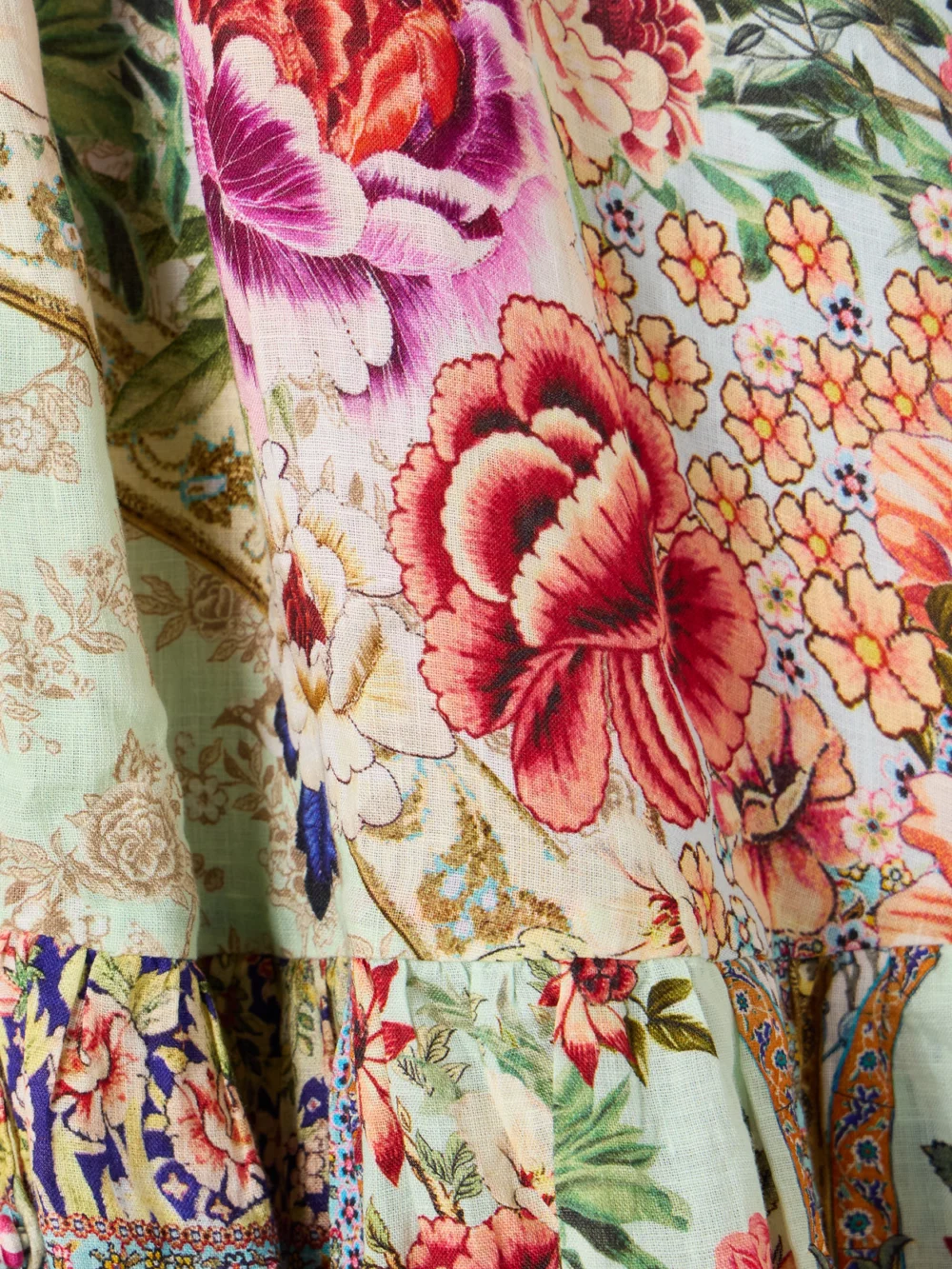 Close-up detail of the Camilla Crystal-embellished Tiered Floral-print Linen Maxi Dress
