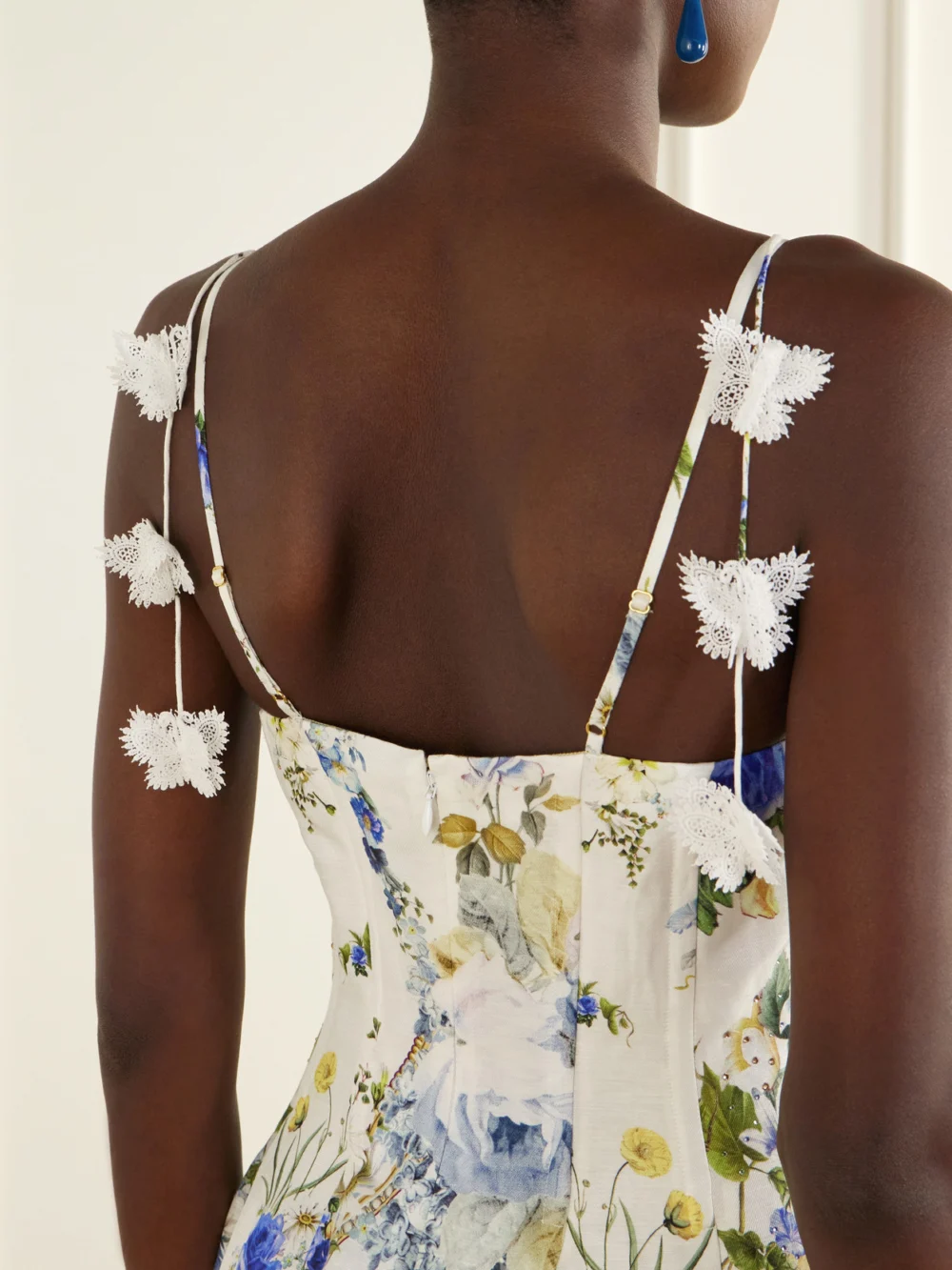 Close-up detail of the Camilla Embellished Floral-print Linen and Silk-blend Midi Dress