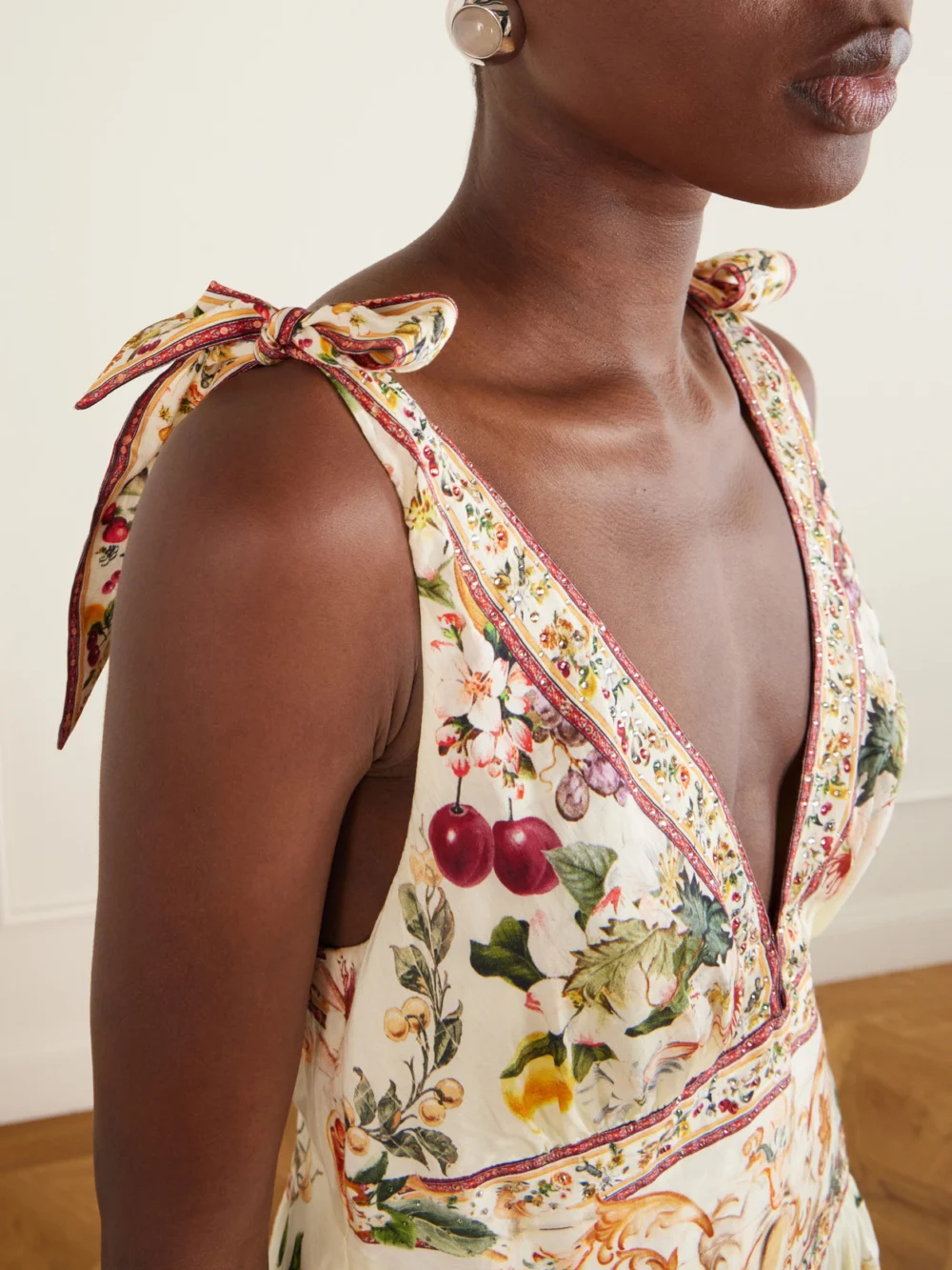 Close-up detail of the Camilla Printed Embellished Linen and Silk-blend Maxi Dress