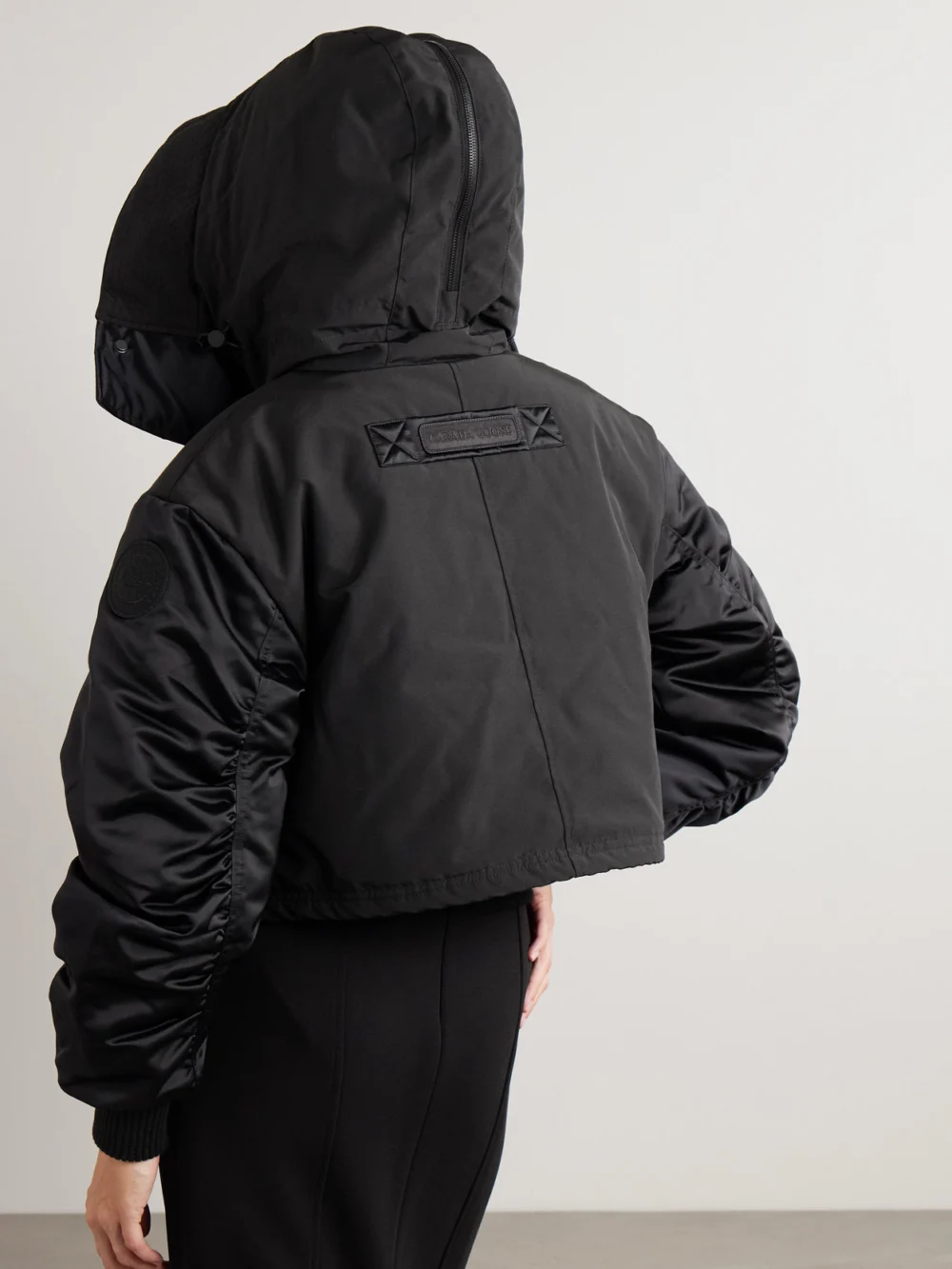 Back view of the Canada Goose Claremont Oversized Cropped Layered Satin and Shell Bomber Jacket