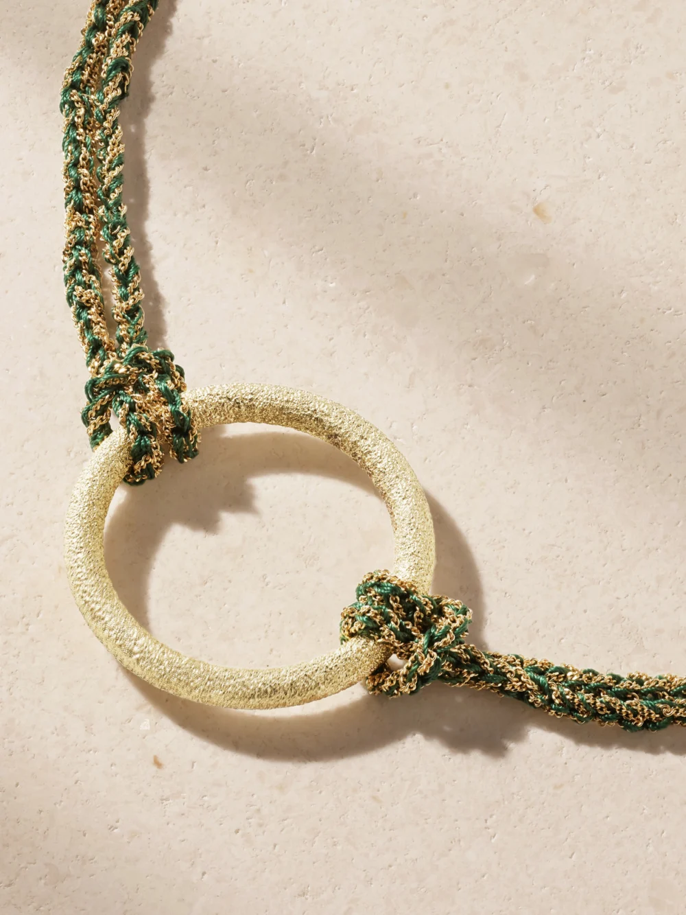 Close-up detail of the Carolina Bucci 1885 Links Lucky Fortune + Ladybug 18-karat Gold and Silk Bracelet