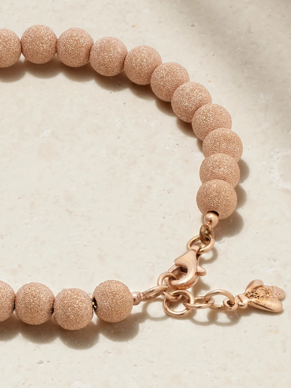 Back view of the Carolina Bucci Florentine Finish 18-karat Rose Gold Beaded Bracelet